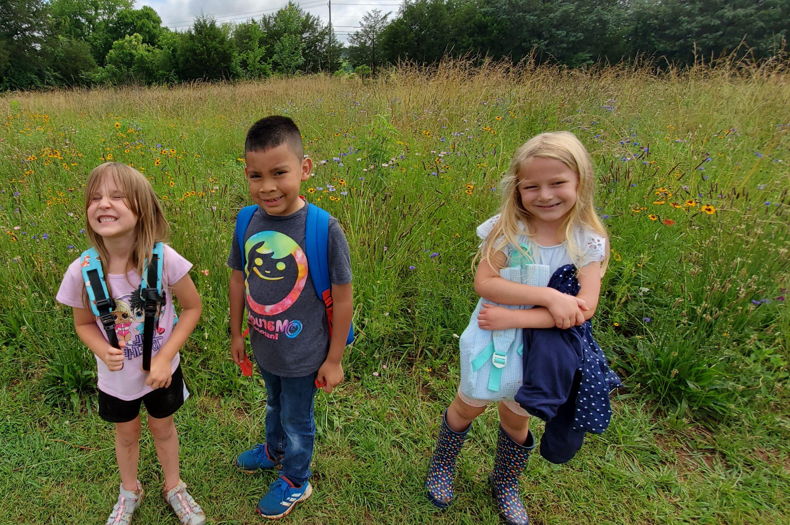 Young students with smiling faces at a University of Montevallo Environmental Education camp.